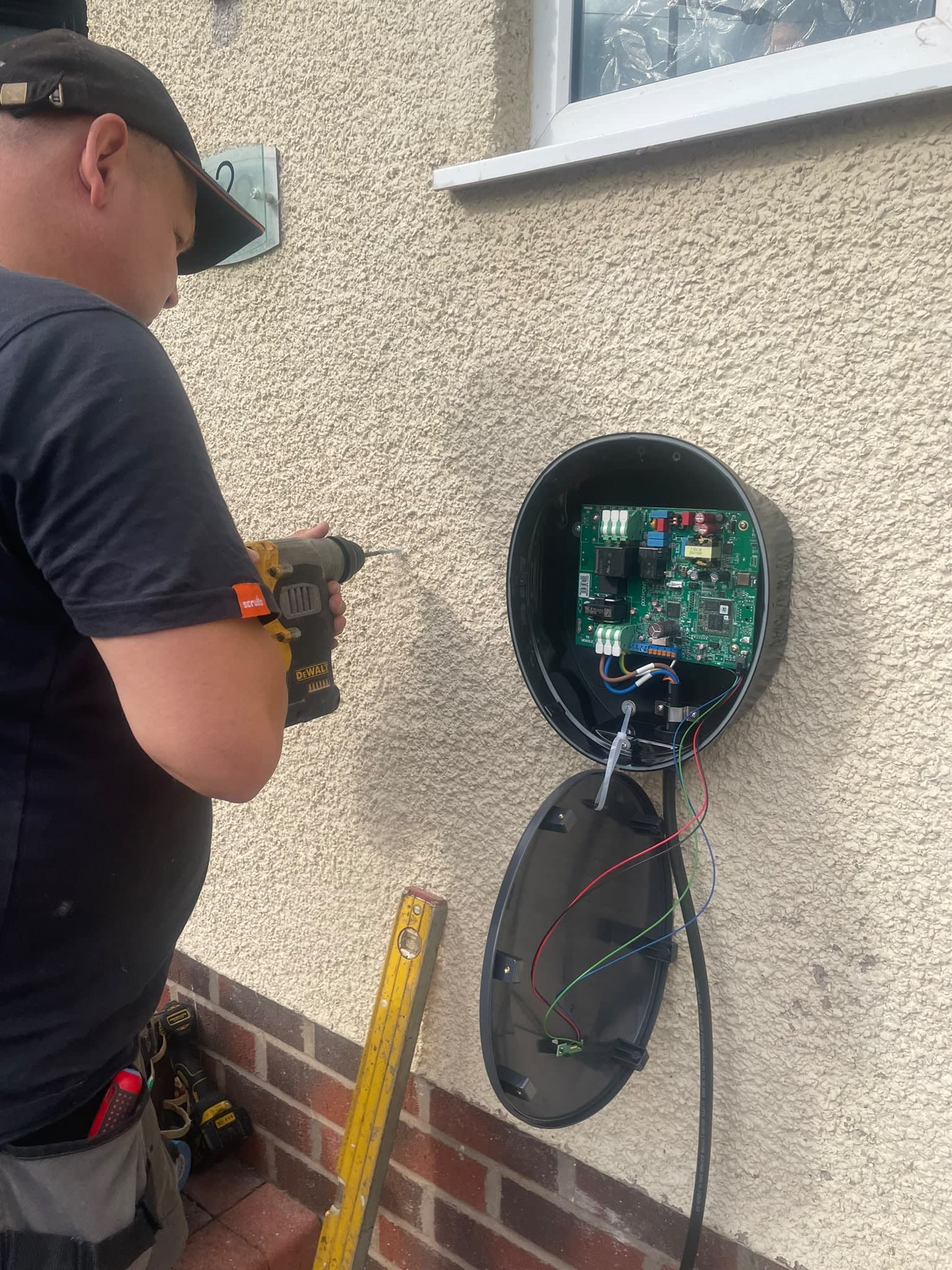 A ProServ Electrical electrician carrying out domestic electrical work